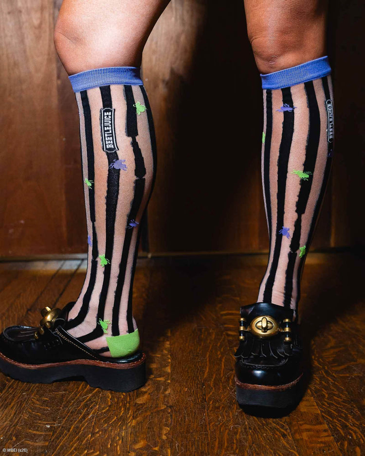 Sock Candy Beetlejuice™ Striped Knee High Sheer Sock Sheer Knee Highs Fashion Socks Striped Knee Highs Beetlejuice Socks Beetlejuice Knee Highs Halloween Socks